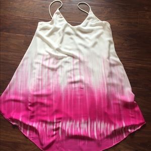 Women’s cream/pink dress.